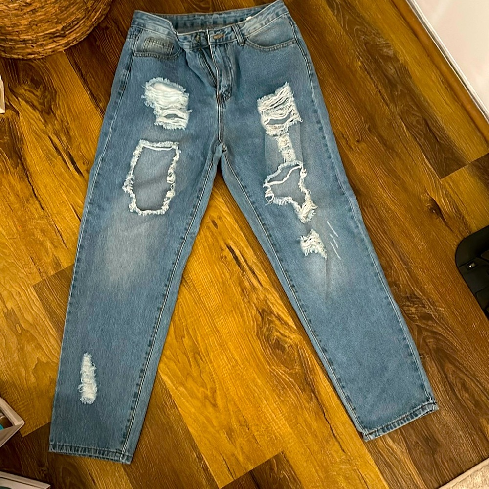 Pink Lily high-waisted light wash jeans with holes
